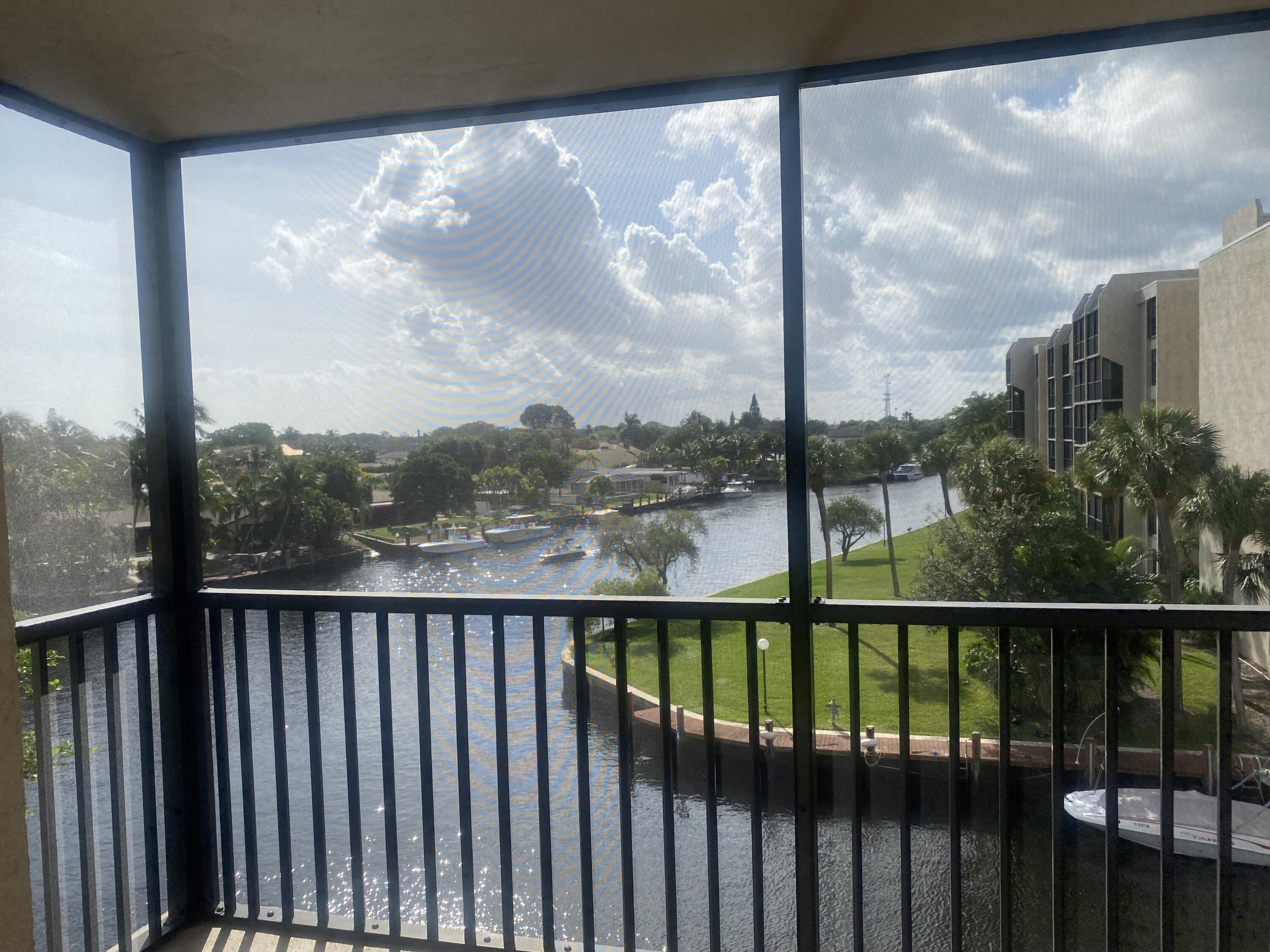 a view of a city skyline from a balcony