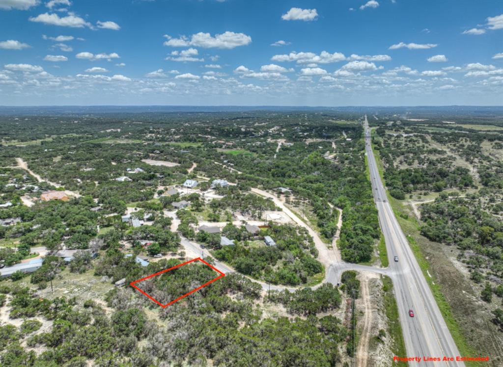 a view of a city with lots of trees