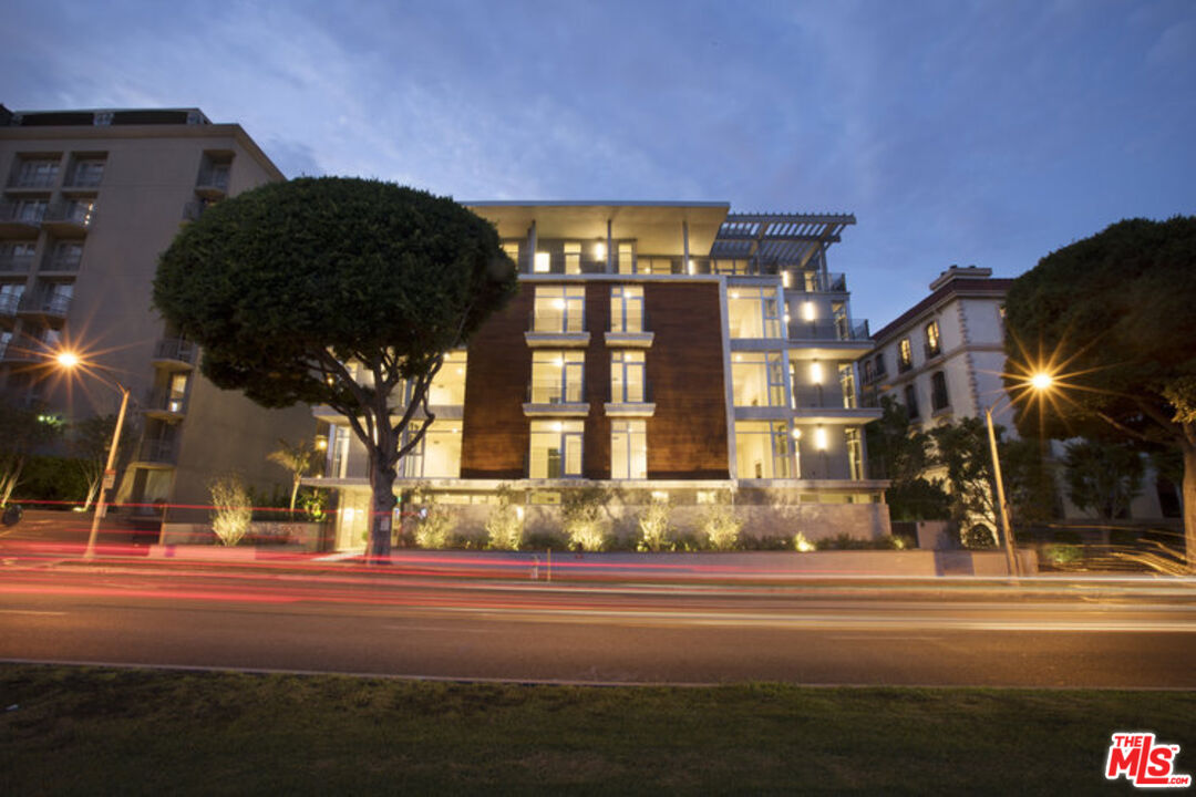 a building exterior with the view of buildings