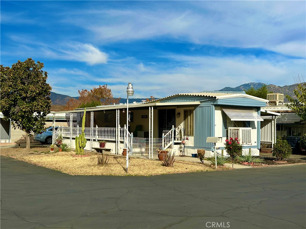 a front view of a building with street view