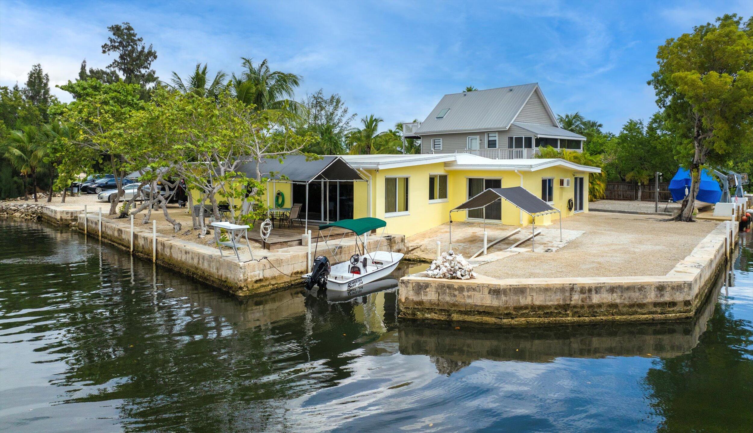 a front view of a house with swimming pool