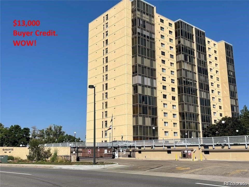 a tall building sitting on the side of a street