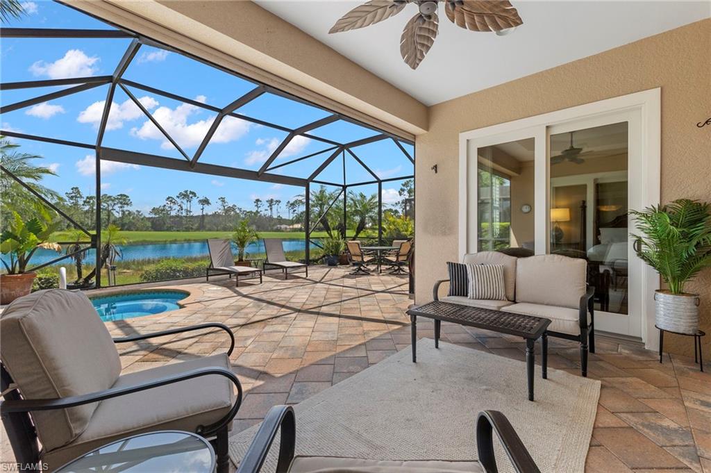 a view of a livingroom with furniture and garden view