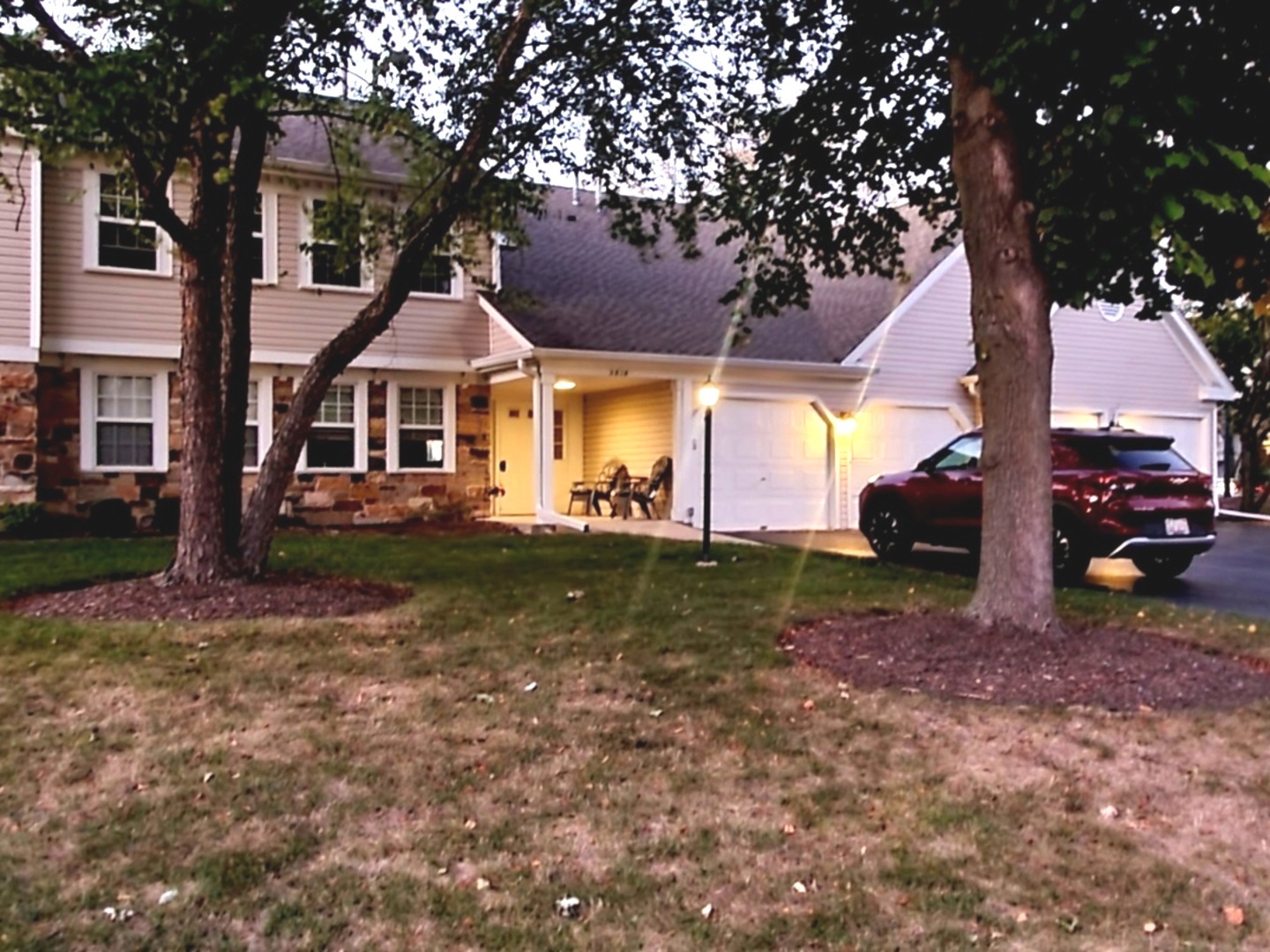 a view of a house with a yard