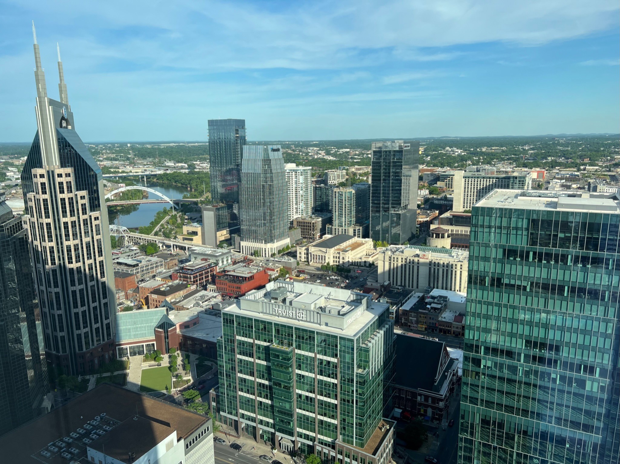 a view of city with tall buildings