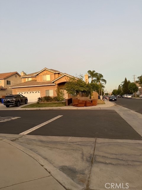 a view of a street with houses