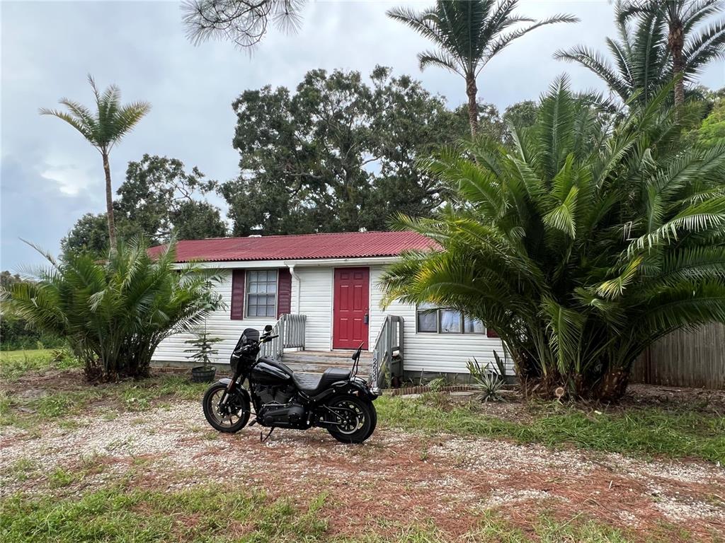 a view of a car in front of house