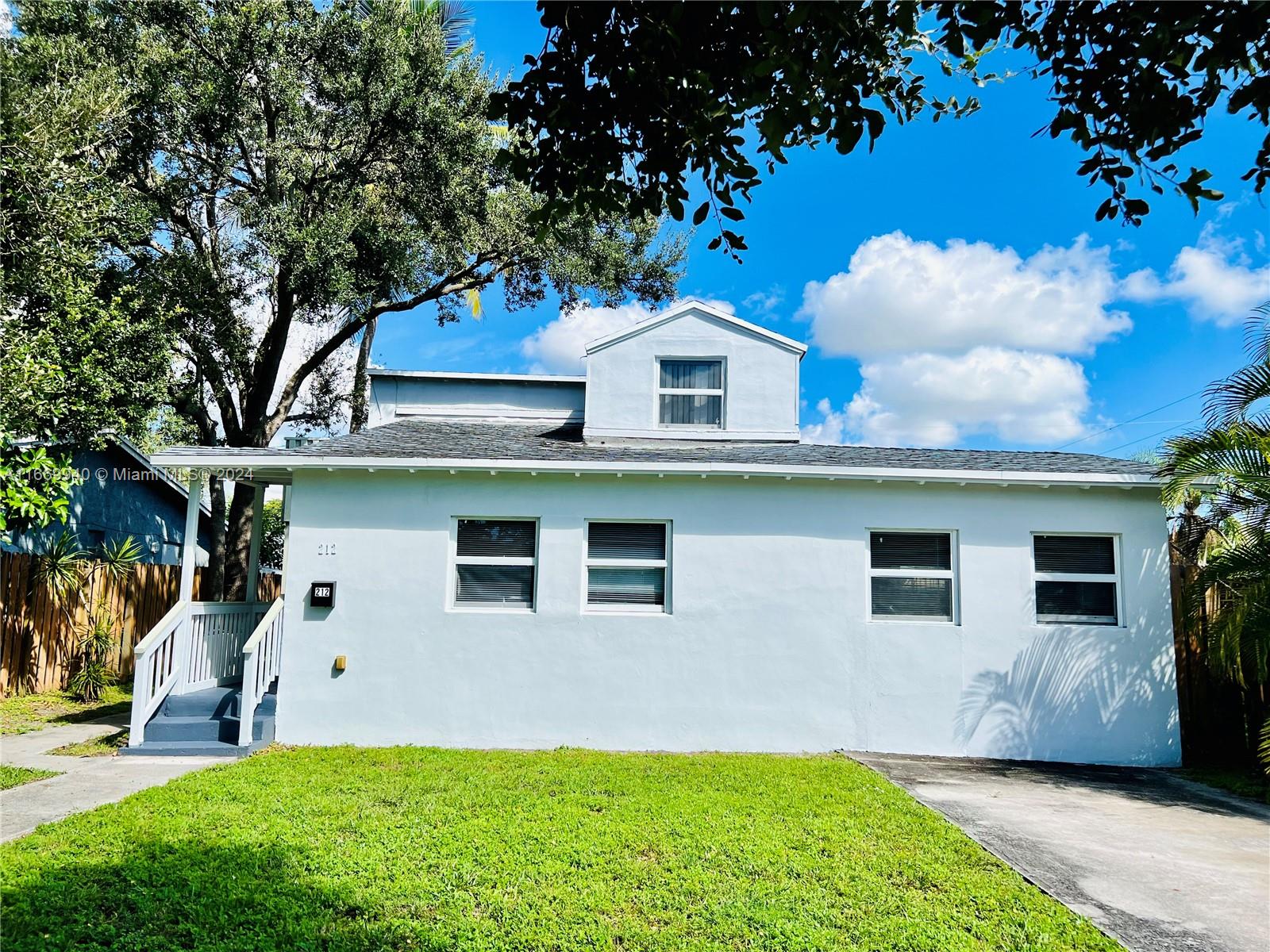 a front view of house with yard