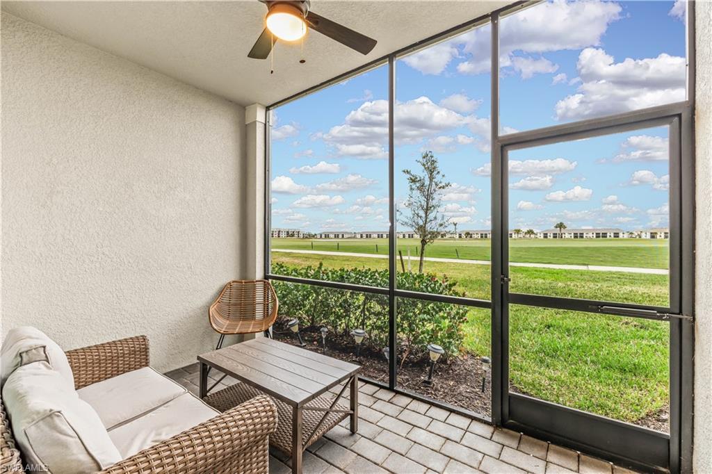 a living room with large windows