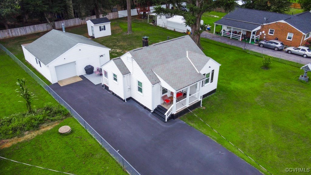 an aerial view of a house having yard