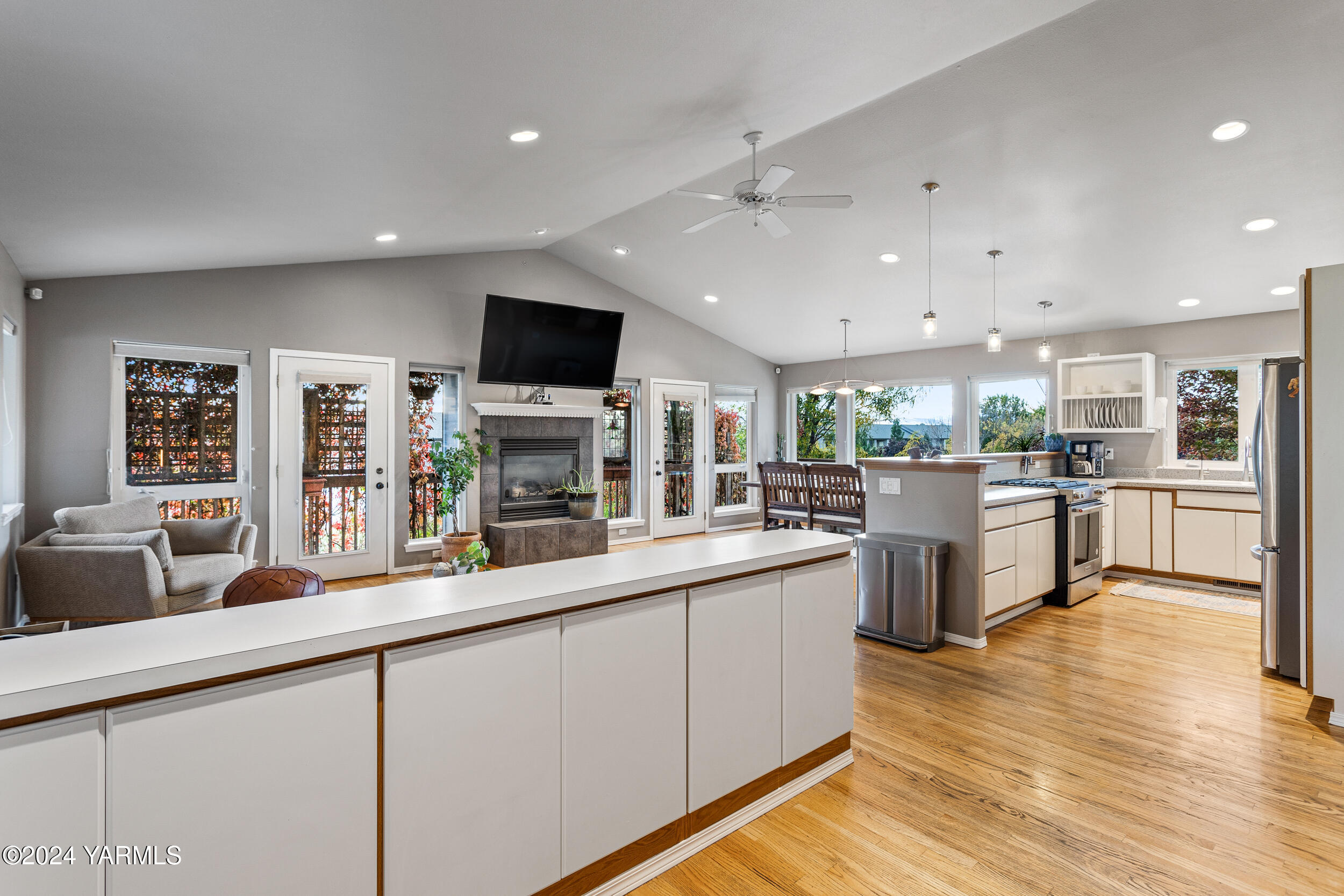 a kitchen with counter top space cabinets and stainless steel appliances