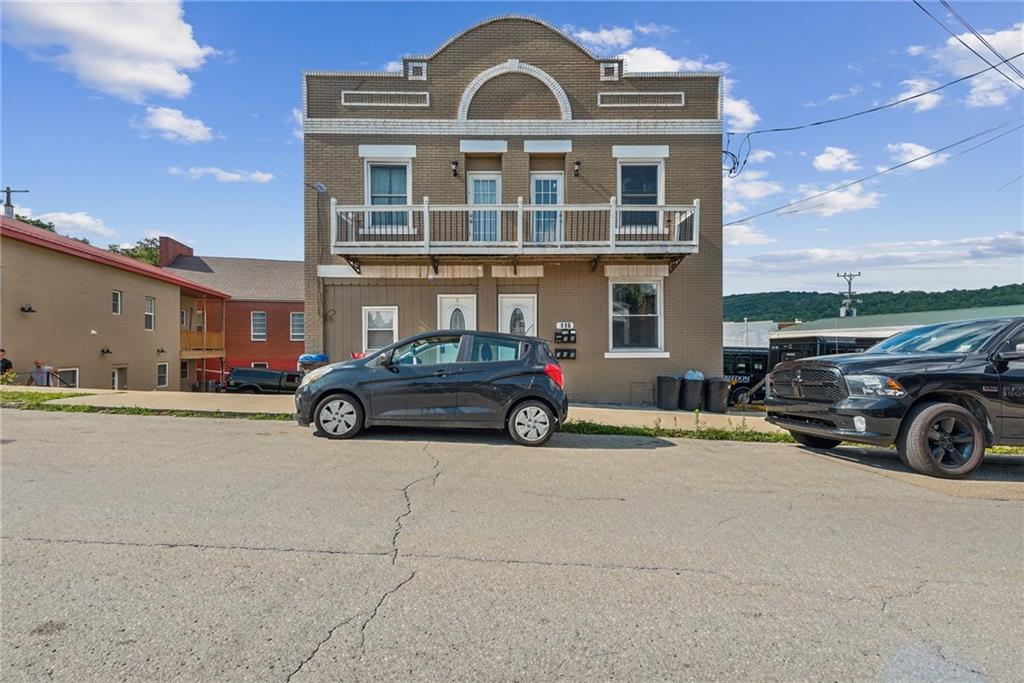 a car parked in front of a house