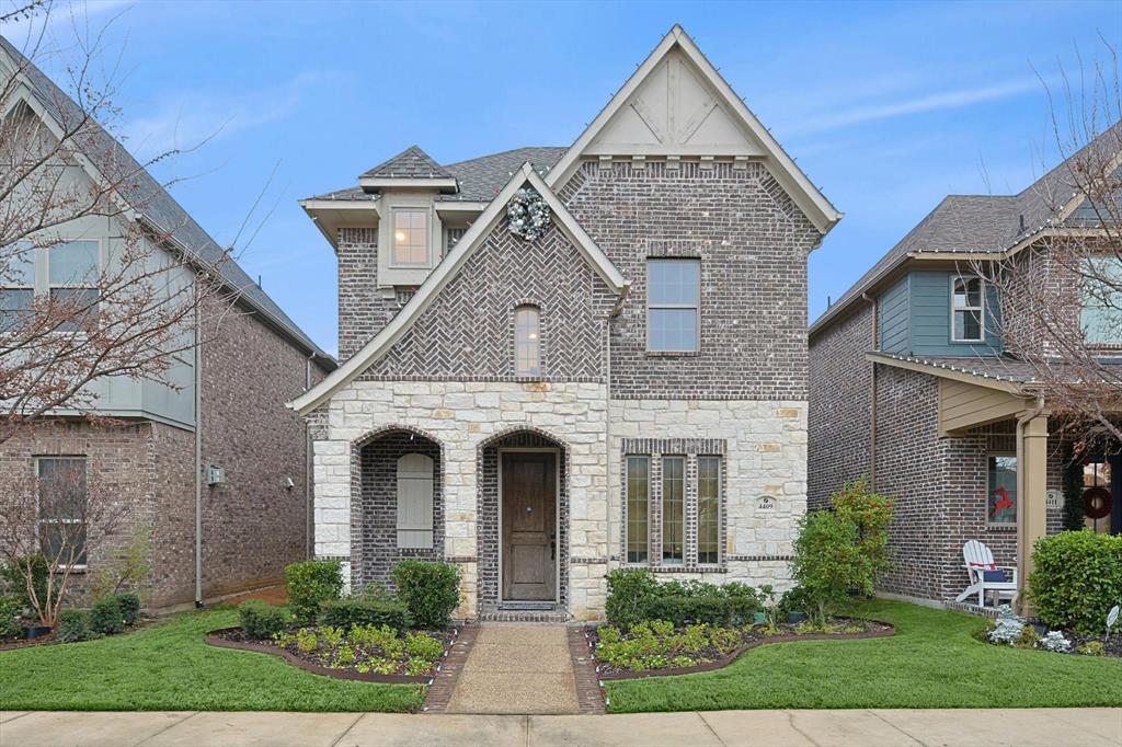 front view of a house with a yard