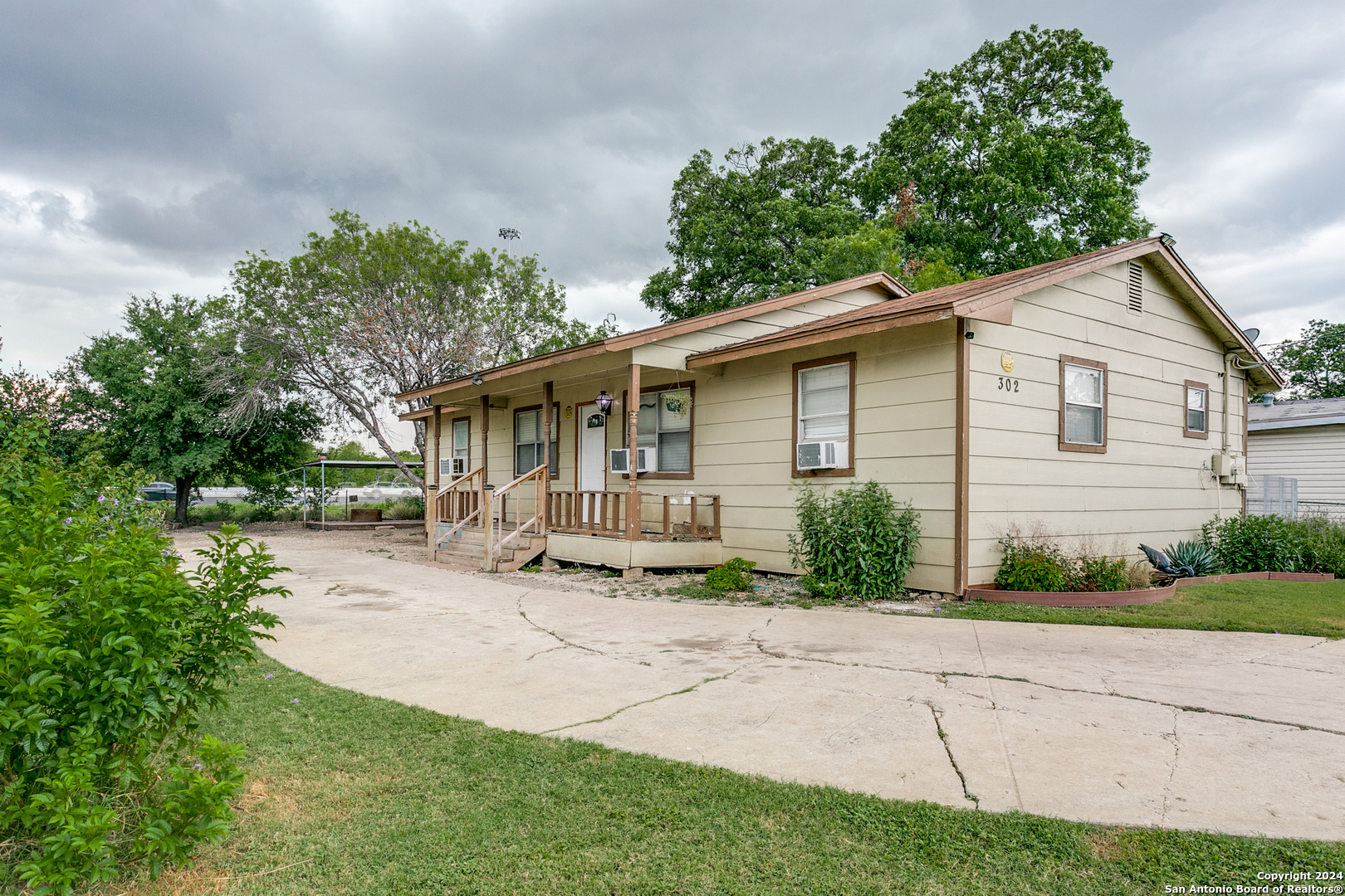 front view of a house with a patio