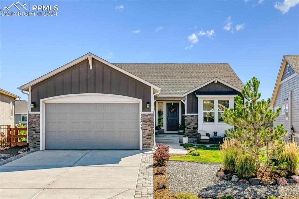 View of front of property featuring a garage