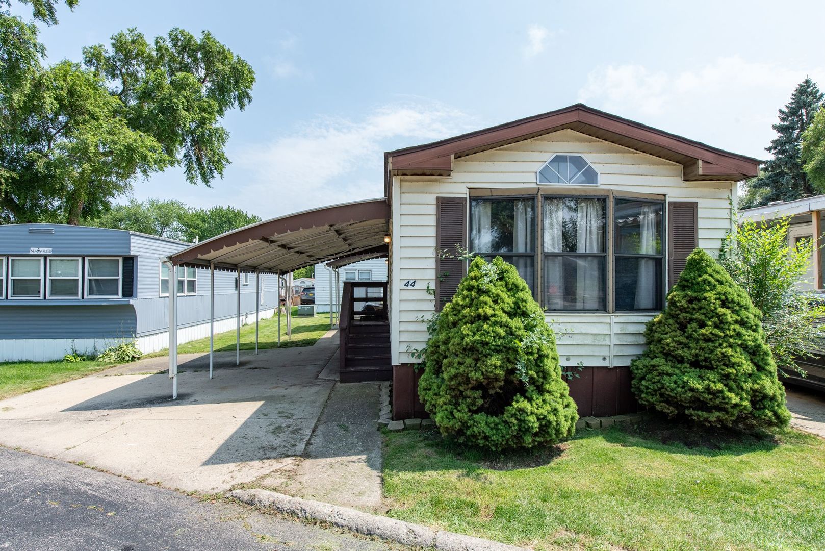 front view of a house with a yard