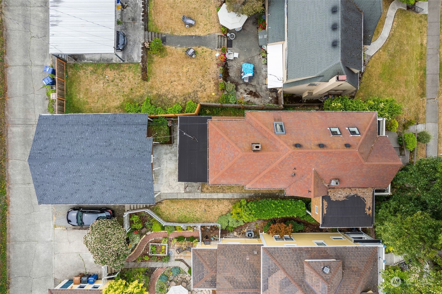 an aerial view of a house with a swimming pool