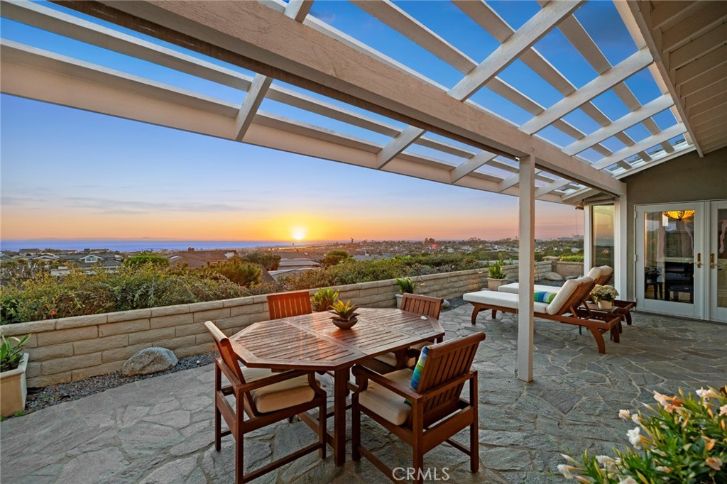 a view of a two chairs in the roof deck