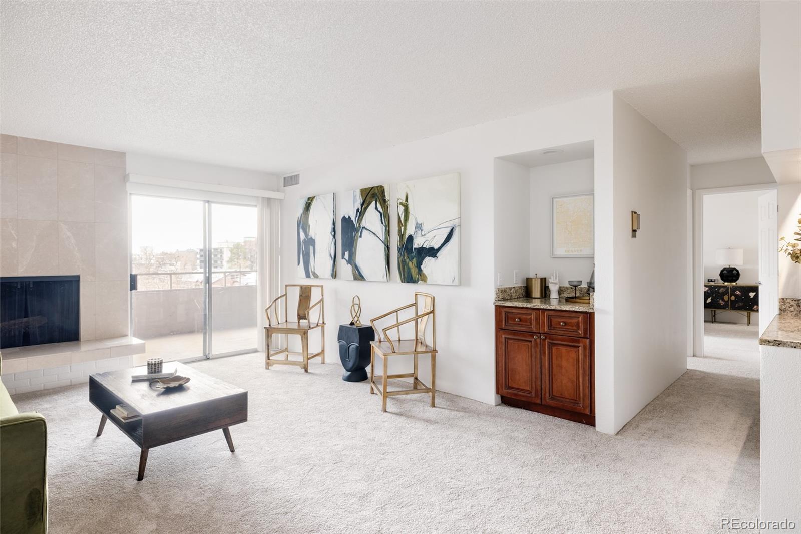 a living room with furniture and a table