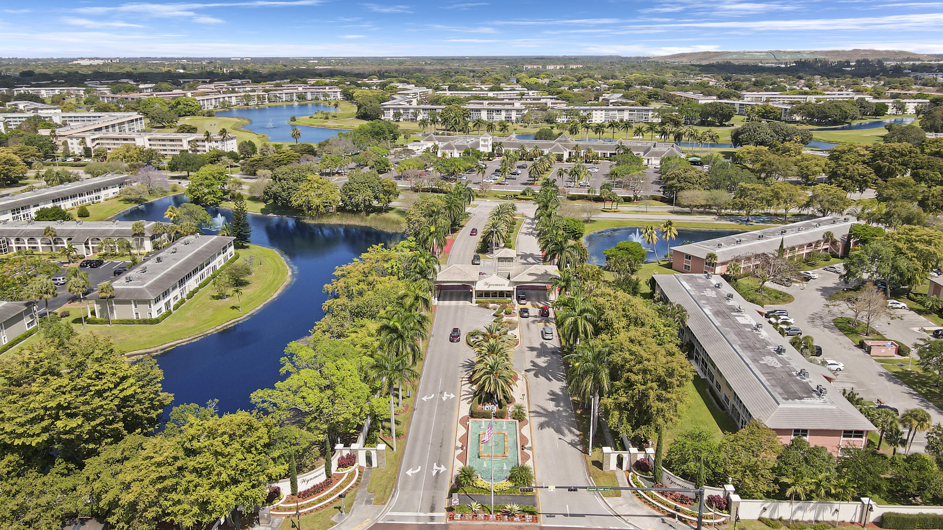 an aerial view of residential building and lake