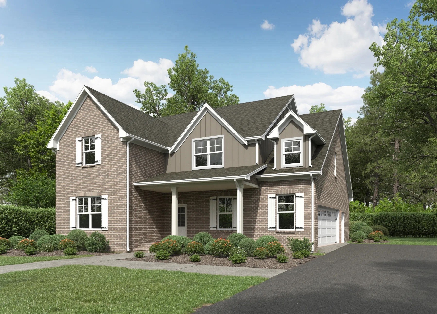 a front view of a house with a yard and trees