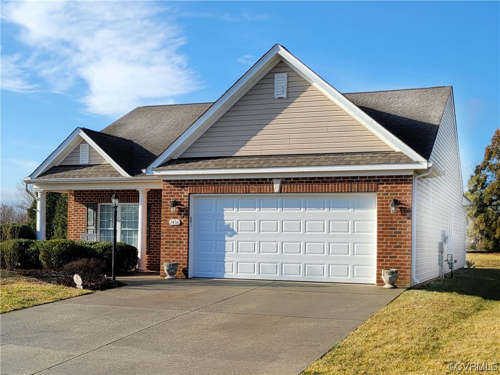 a front view of a house with a garage