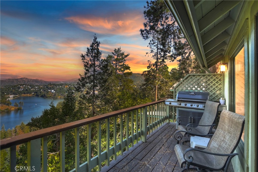 a view of a balcony with chairs