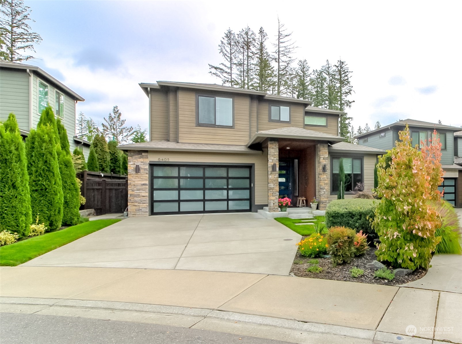 front view of a house with a yard