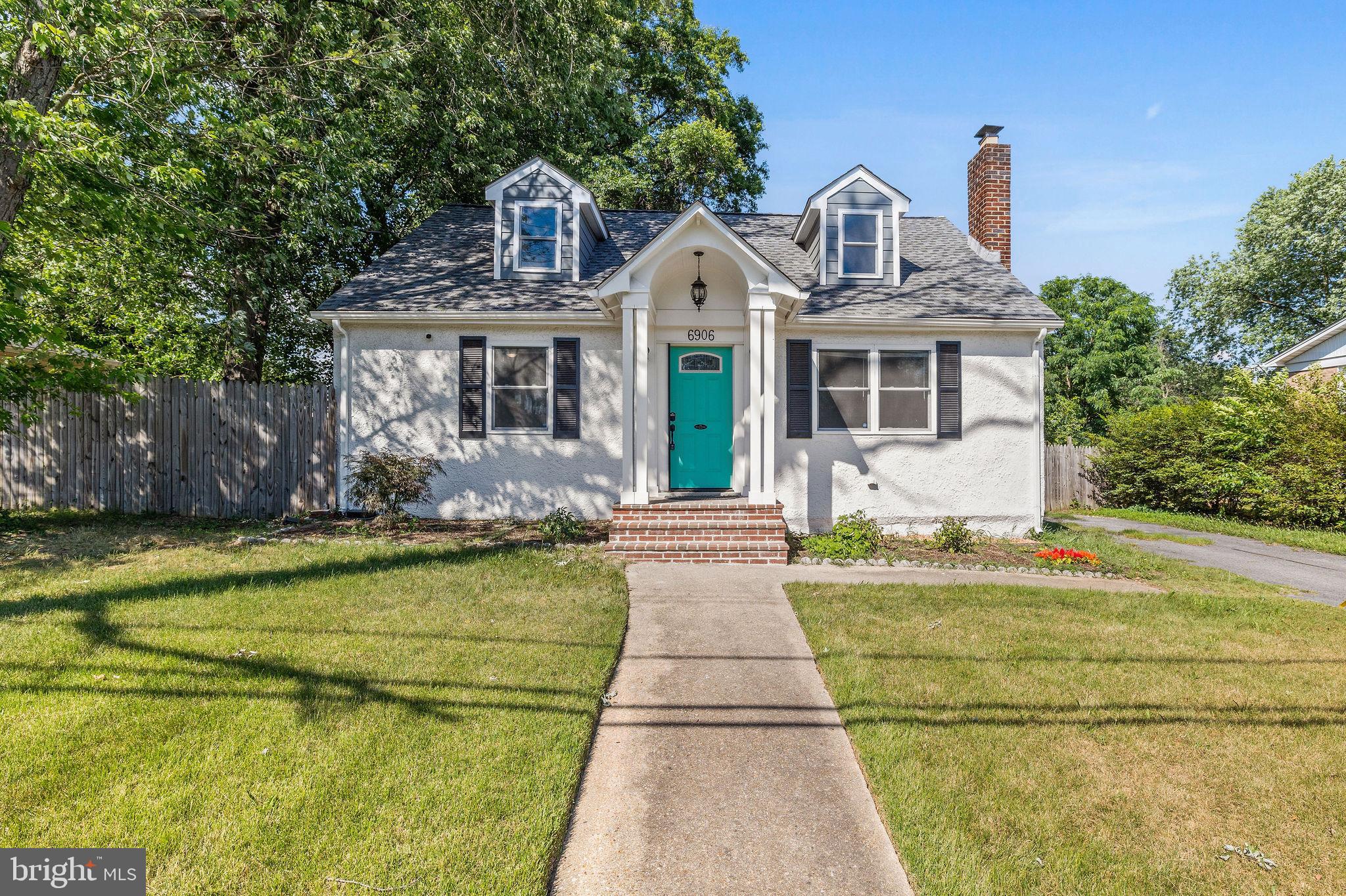 a front view of a house with swimming pool