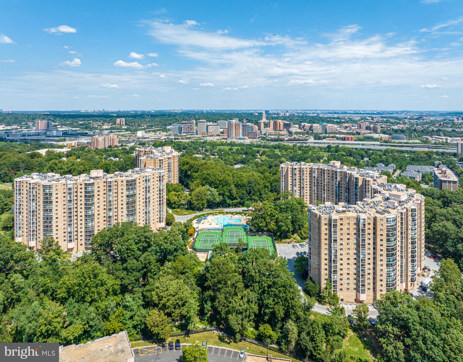 a view of a city with tall buildings