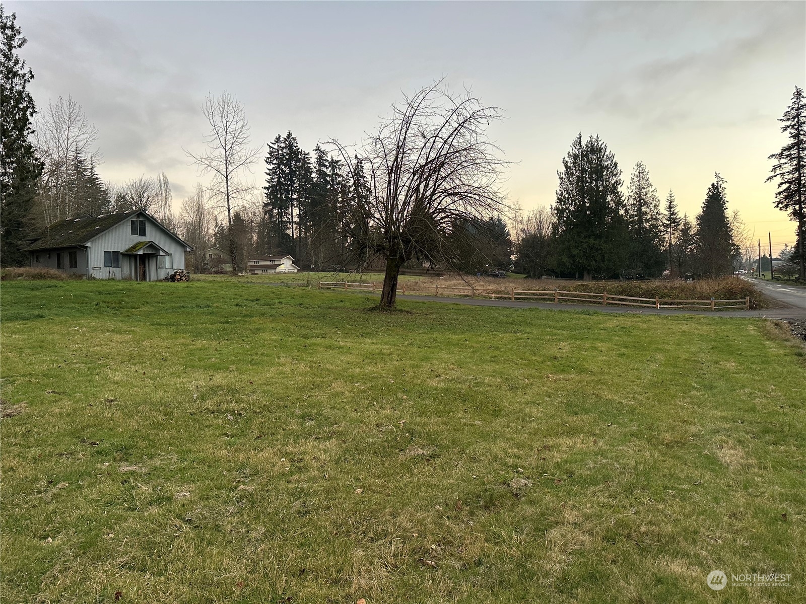 a view of outdoor space with deck and yard