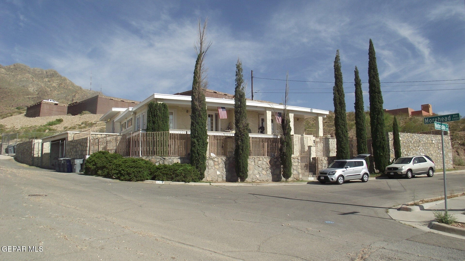 a view of a building with a street