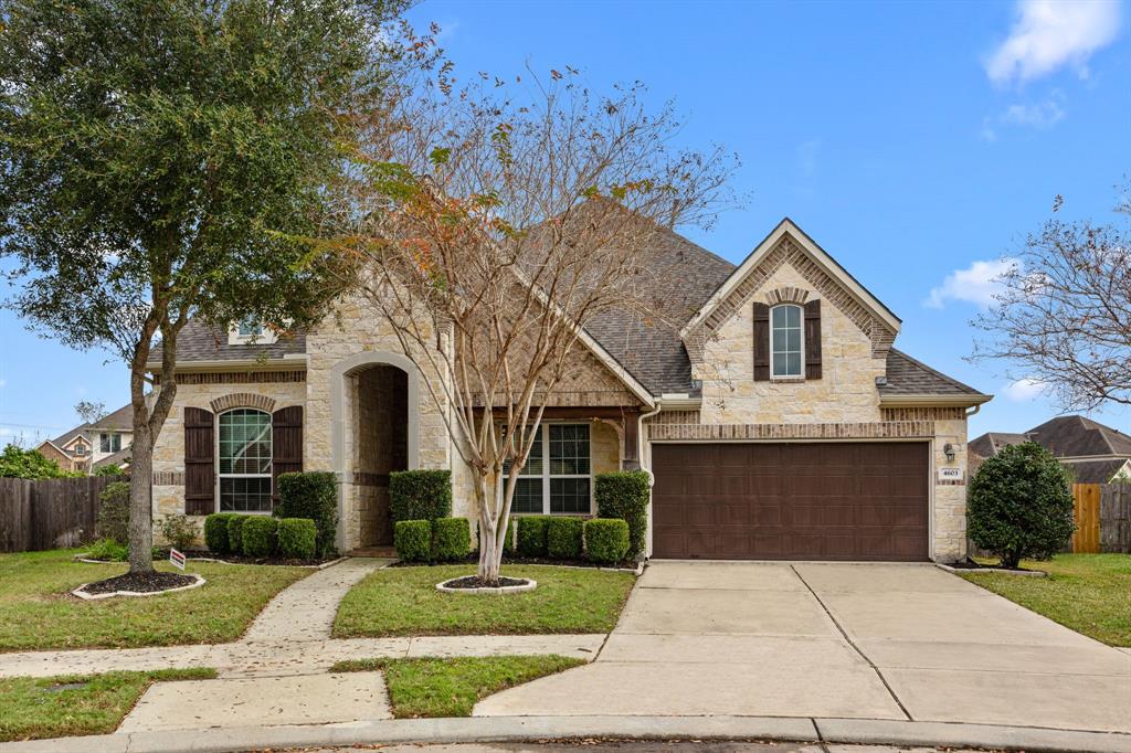 Fabulous 4/3/2 stone and brick, one-story home located on a quiet cul-de-sac very close to the clubhouse in the fabulous master-planned community of Riverstone. Roof replaced in 2023!