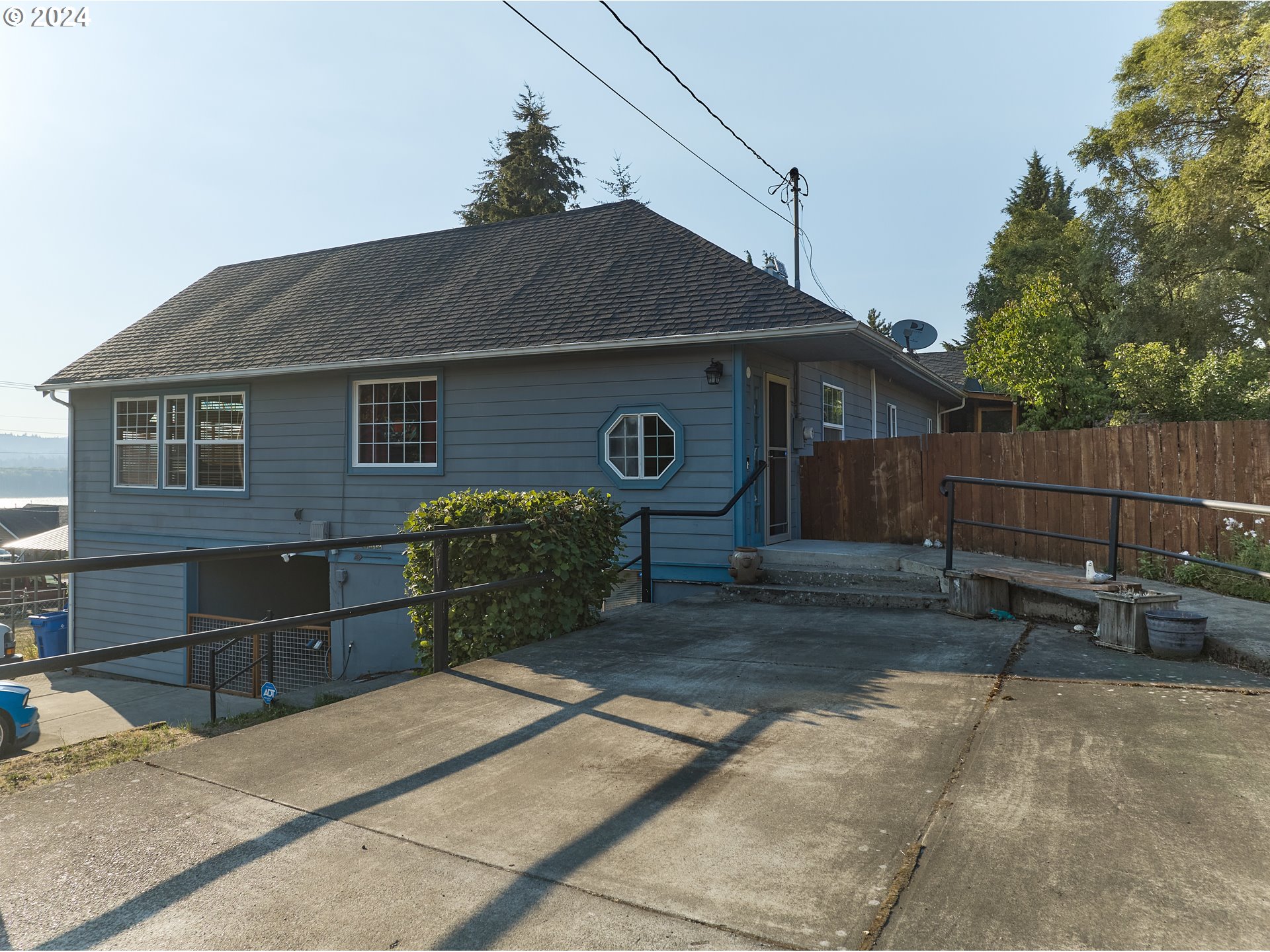 a front view of a house with garage