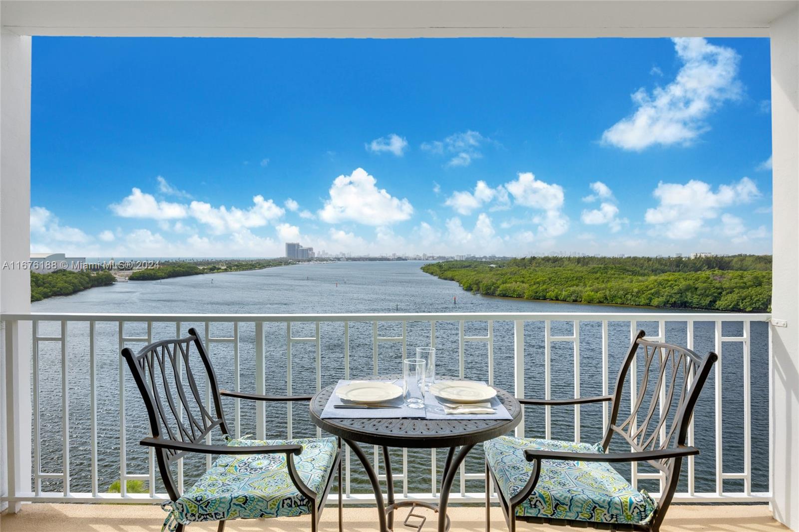 a view of a balcony with furniture