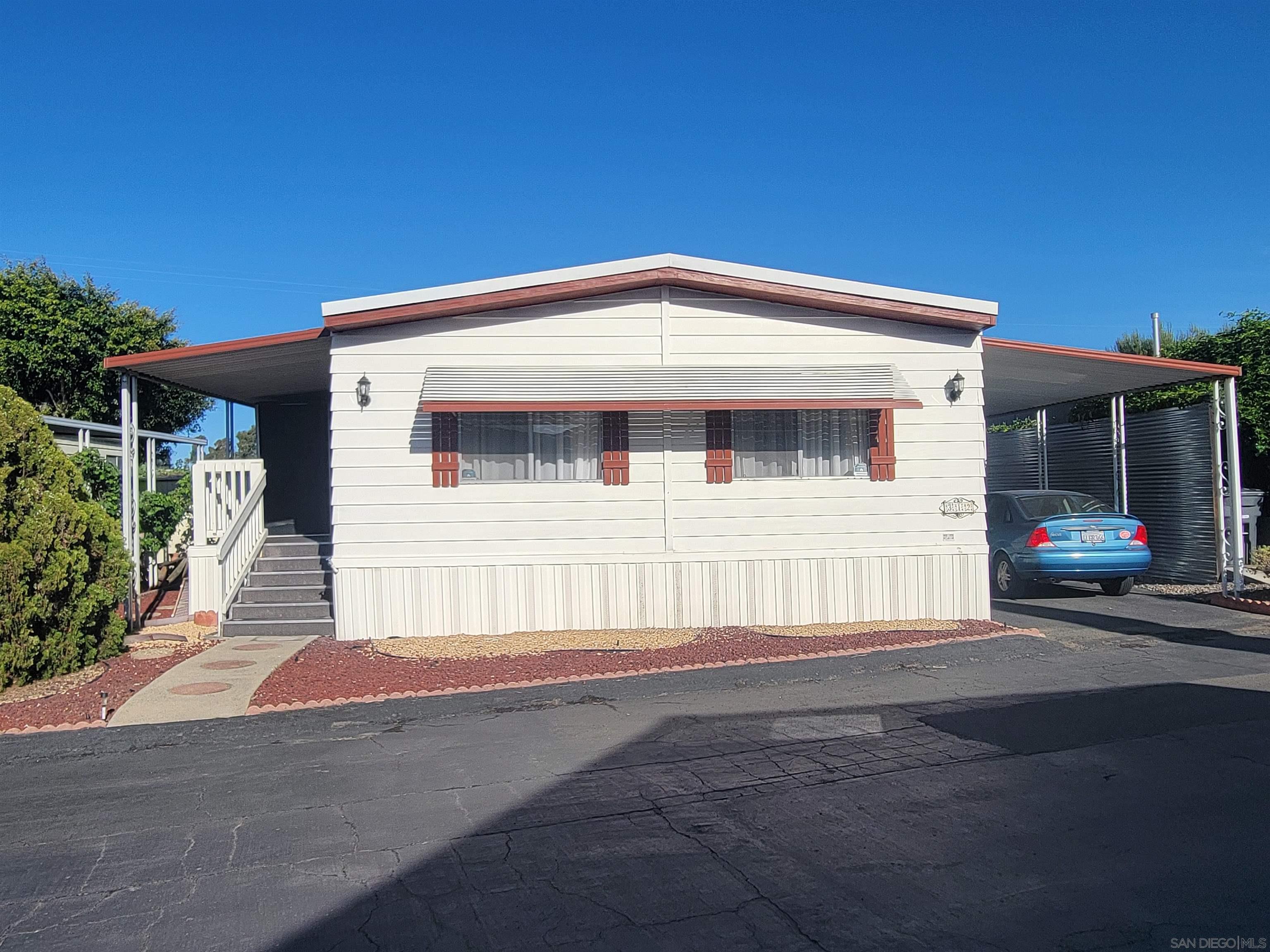 a front view of a house with a garage