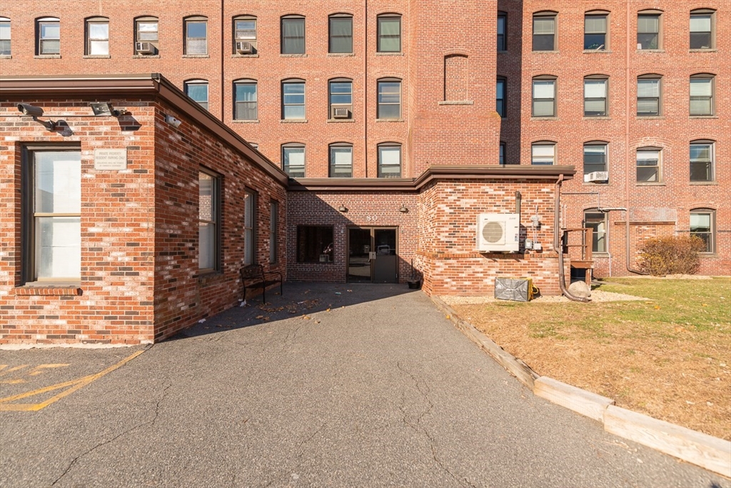 a view of a building with a street