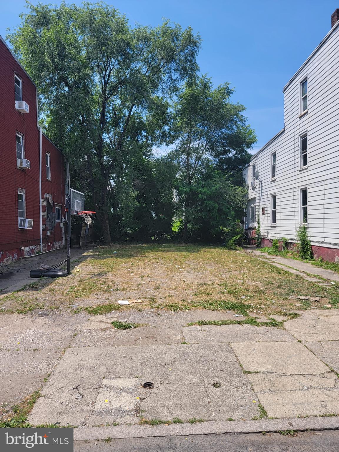 a view of a yard with an outdoor space