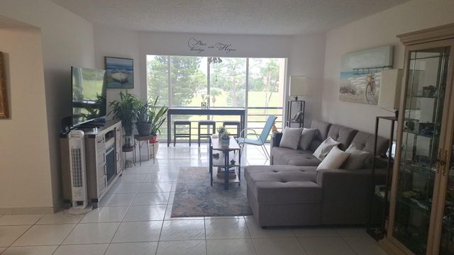 $185,000 | 3836 Via Poinciana, Unit 404 | Poinciana Place