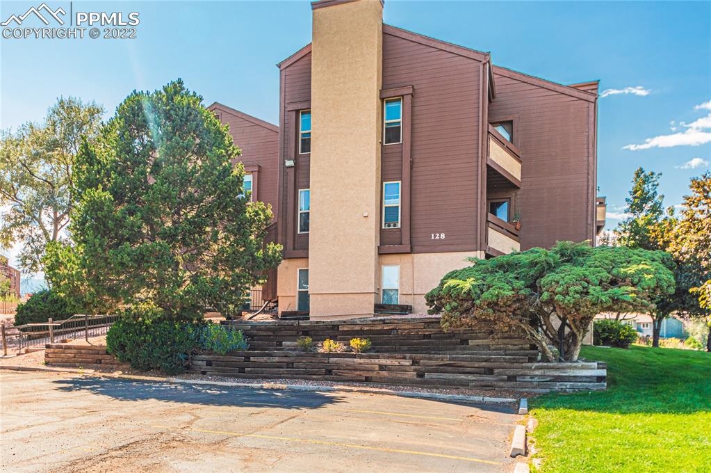 a building with trees in front of it