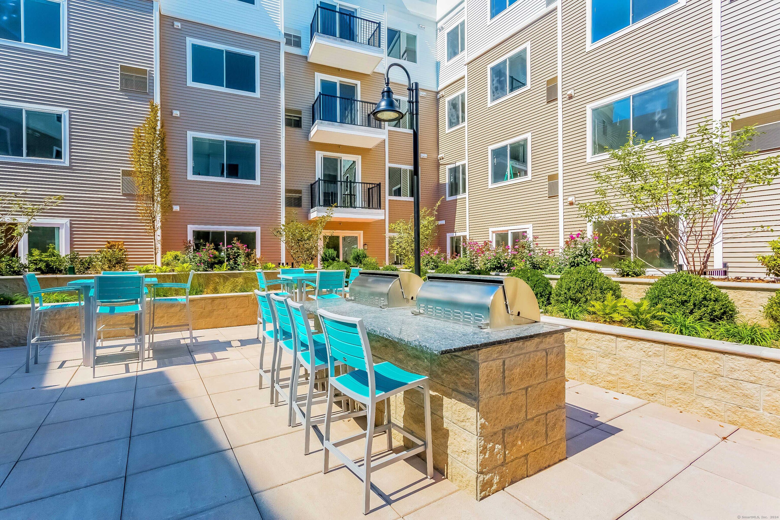 a view of a swimming pool with a lounge chair