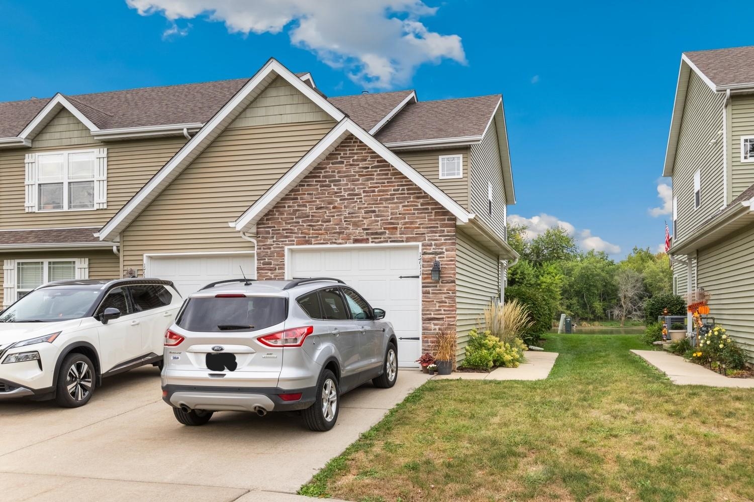 a view of a car in front of house