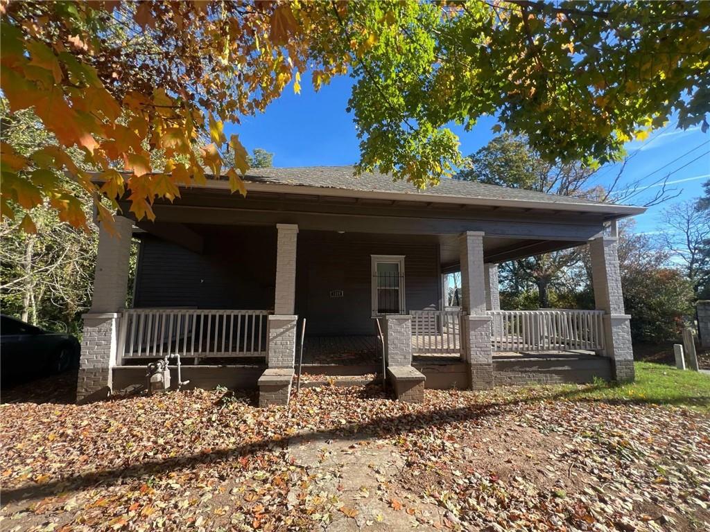 a front view of a house with a porch