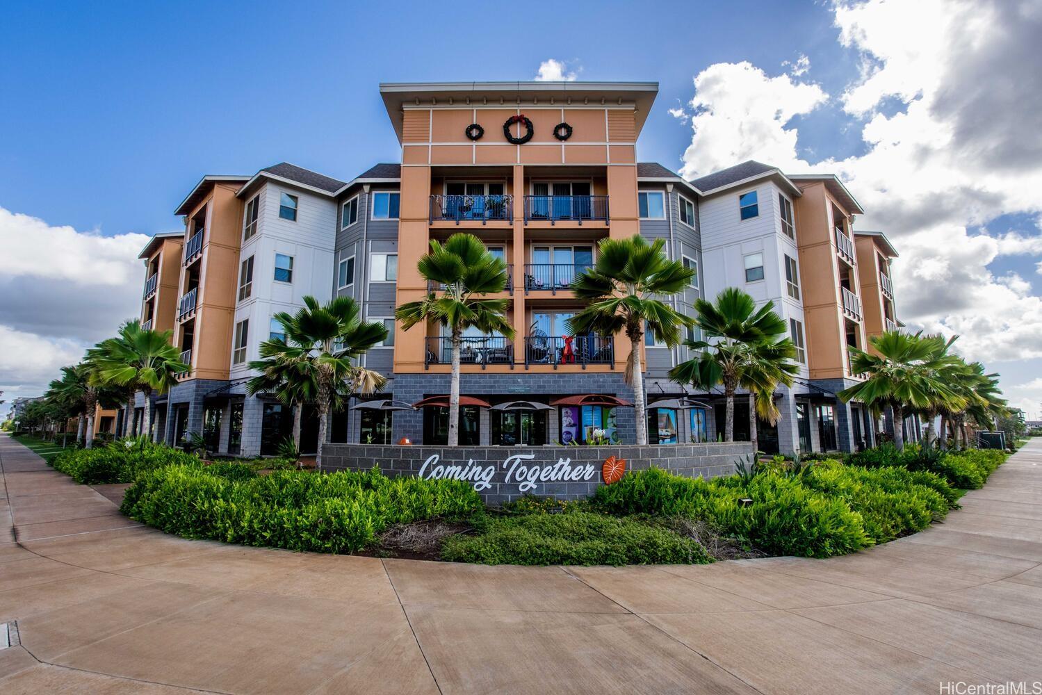 a front view of building with yard