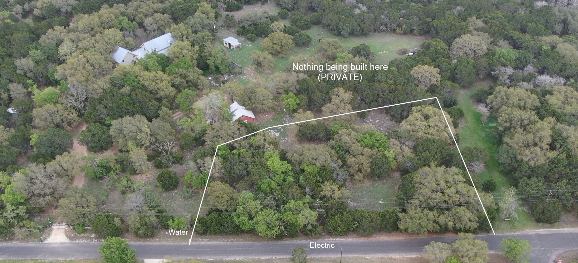 a view of a yard and mountain view