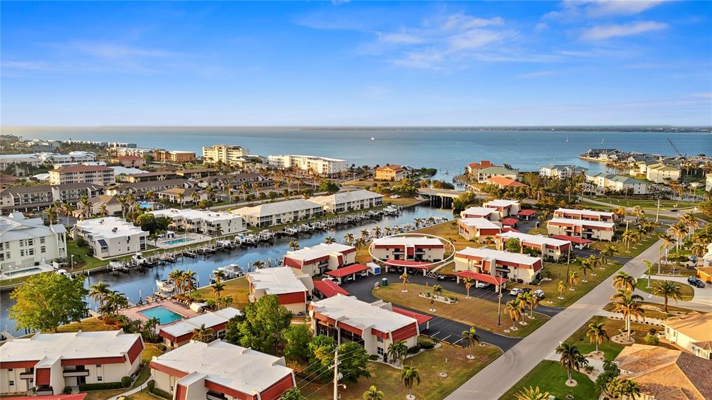 Charlotte Harbor and Fisherman's Village shopping center in the distance. Condo is circled.