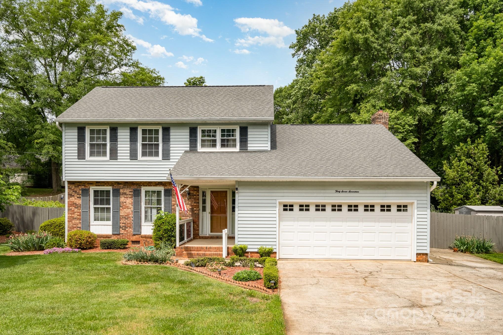 front view of a house with a yard