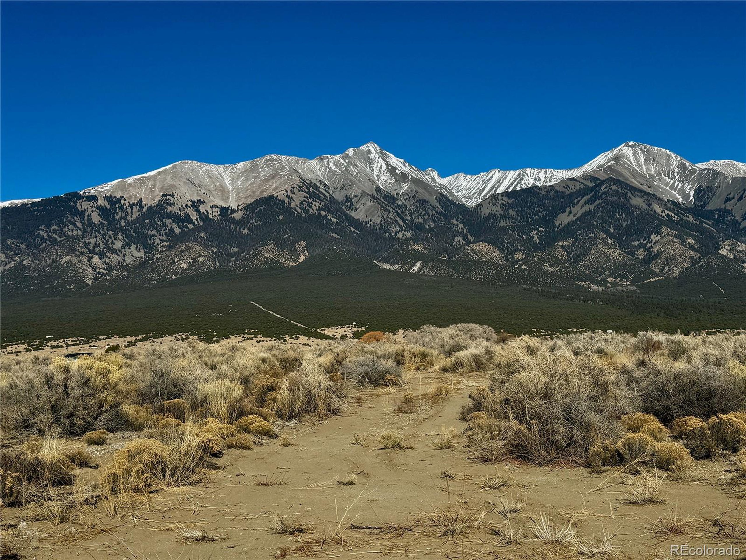 a view of ocean view with a mountain