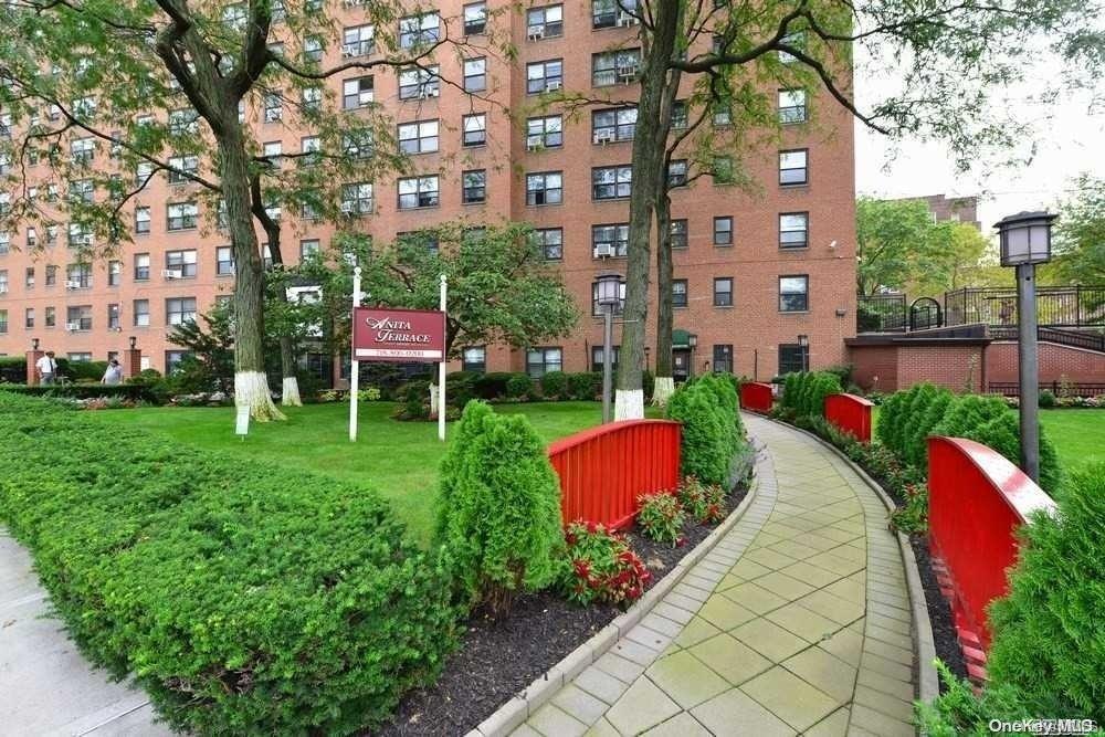 a garden view with a seating space