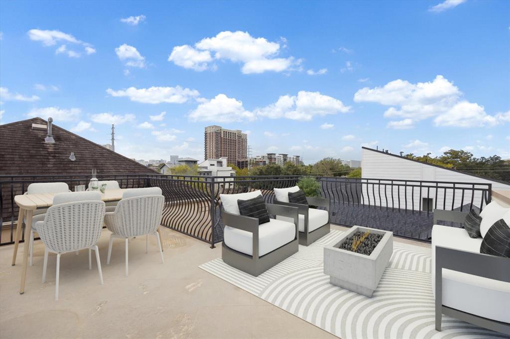 Views for days makes this home prime for relaxing, entertaining and taking in H-town's skyline!This photo is virtually staged.